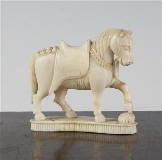 An Indian ivory model of a horse, 19th century, 6.4cm